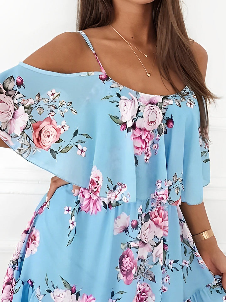 Casual women's floral cold shoulder short dress with flowy ruffle details. A must-have for spring/summer.