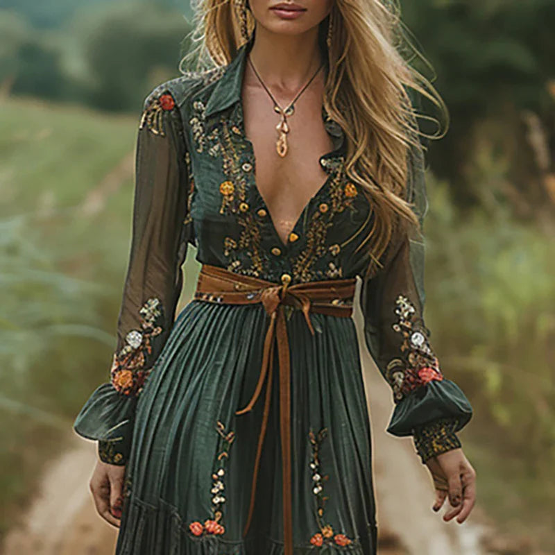 Flowy long-sleeve boho maxi dress for women, featuring intricate floral embroidery & summer fashion.