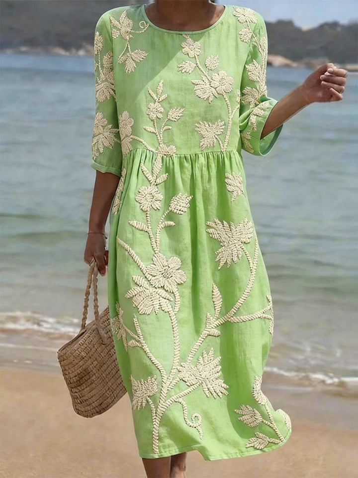 Beautifully embroidered floral maxi dress for women, flowing silhouette, comfortable round neck & 3/4 sleeves.