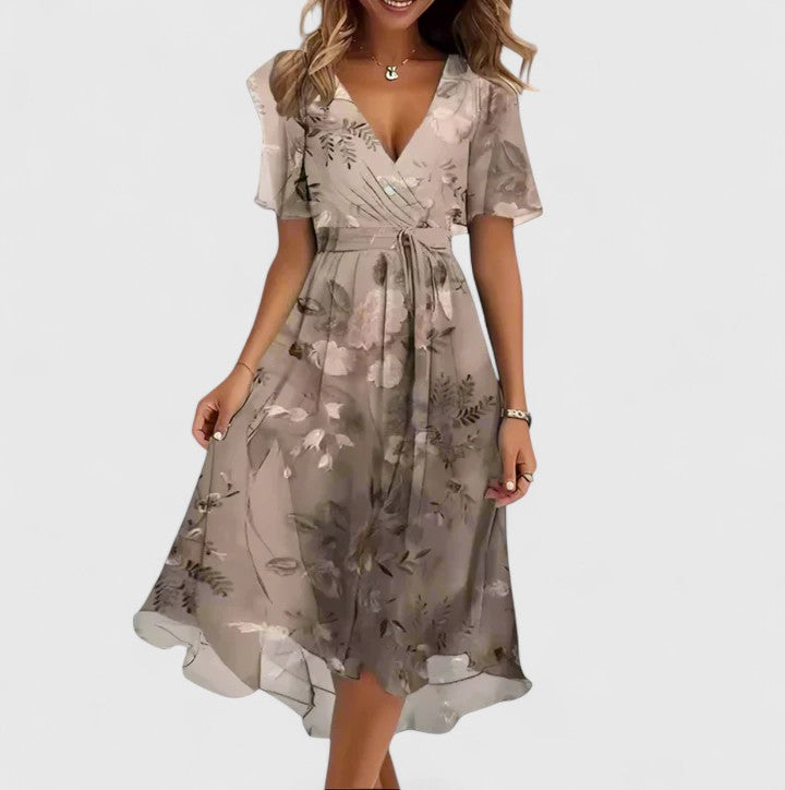 Graceful women's floral V-neck dress with flowy flutter sleeves and a fashionable high-low hem, suitable for parties.