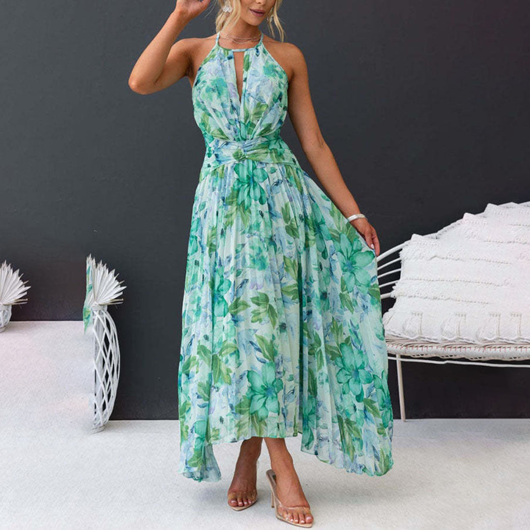 Women's elegant floral maxi dress with a halter neck and delicate pleats for special events.