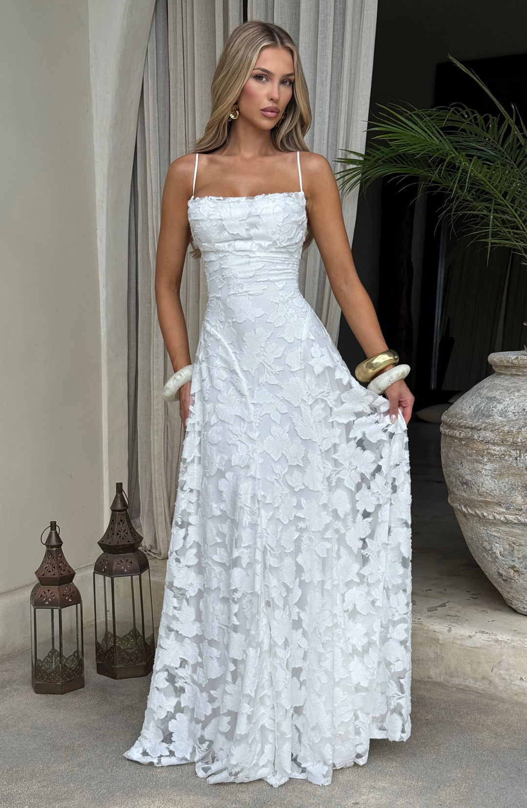 Summer fashion women's floral maxi dress, with a stylish draped neckline & lace-up back.