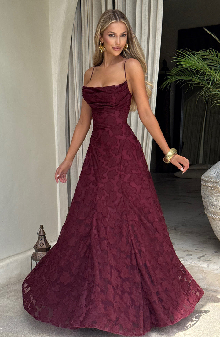 Vacation-ready women's floral maxi dress, draped neckline, perfect for casual summer wear.