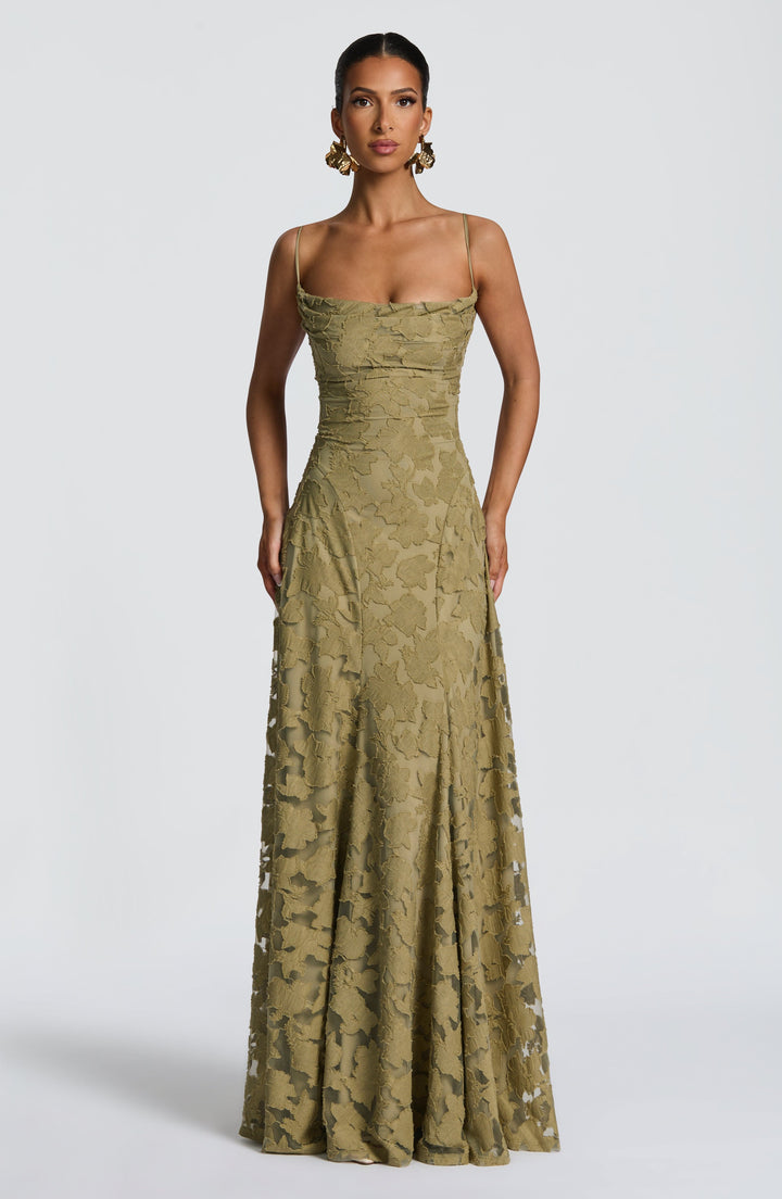 Elegant women's floral maxi dress with a unique lace-up back & flowing A-line skirt.