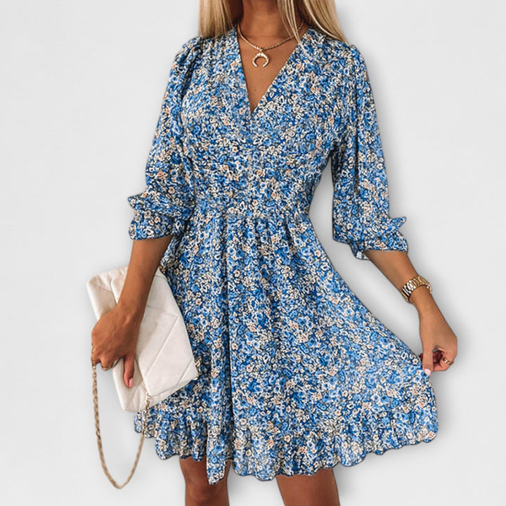 Versatile women's floral puff sleeve A-line dress, perfect for garden parties or everyday summer fashion.