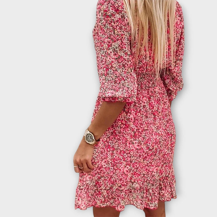 Comfortable women's floral A-line dress with puff sleeves, a stylish and versatile summer midi option.