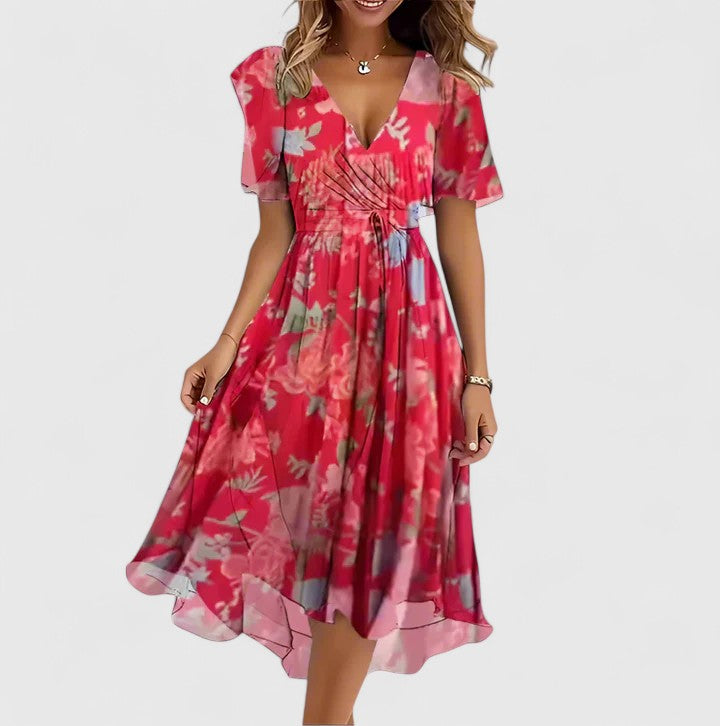 Women's floral plunge V-neck midi dress with flutter sleeves, perfect for summer garden parties.