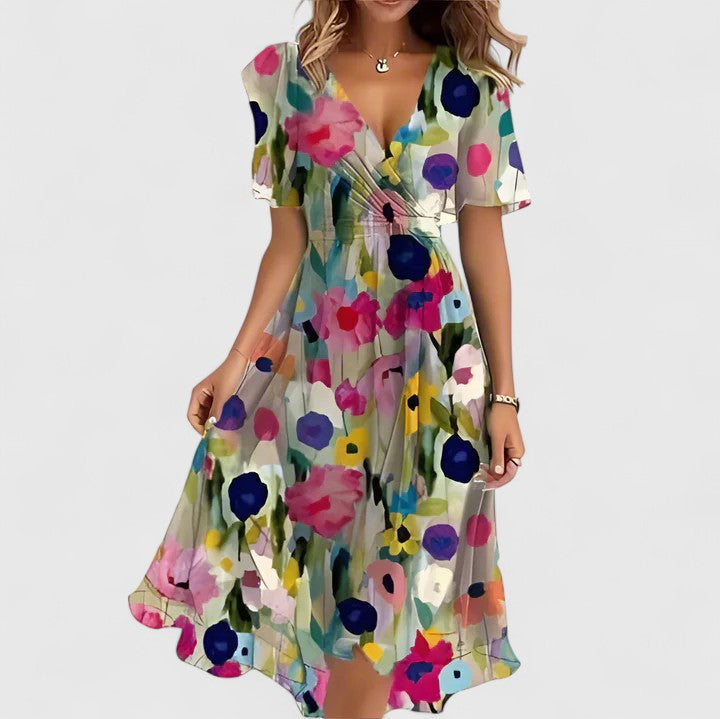 Women's summer floral midi dress with a stylish plunge V-neck, airy flutter sleeves & a high-low hem. Party ready.