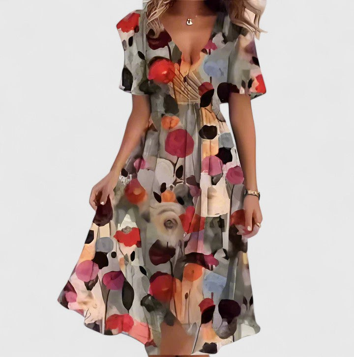 Spring women's floral midi dress featuring a deep plunge V-neck and playful flutter sleeves. Perfect elegant garden party look.