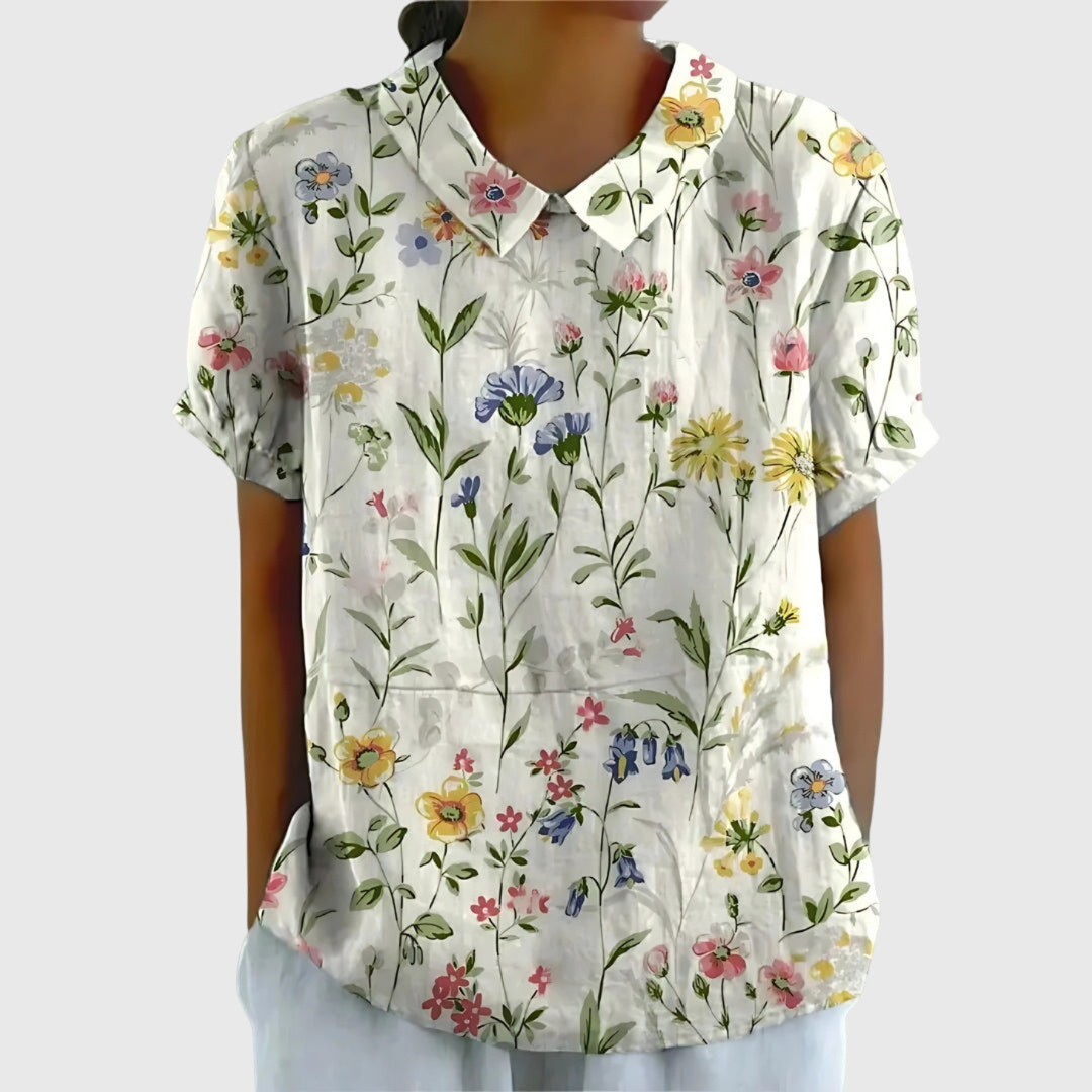 Women's floral print collared blouse, short sleeve, relaxed fit, perfect for summer casual wear.
