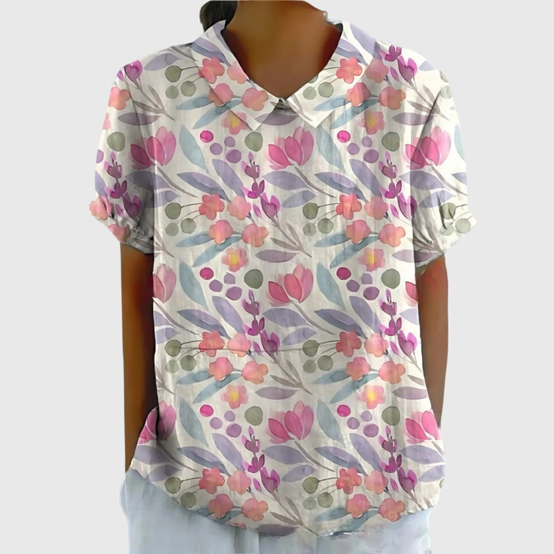 Chic floral print collared blouse for women, short sleeves, a vibrant print top for everyday fashion.