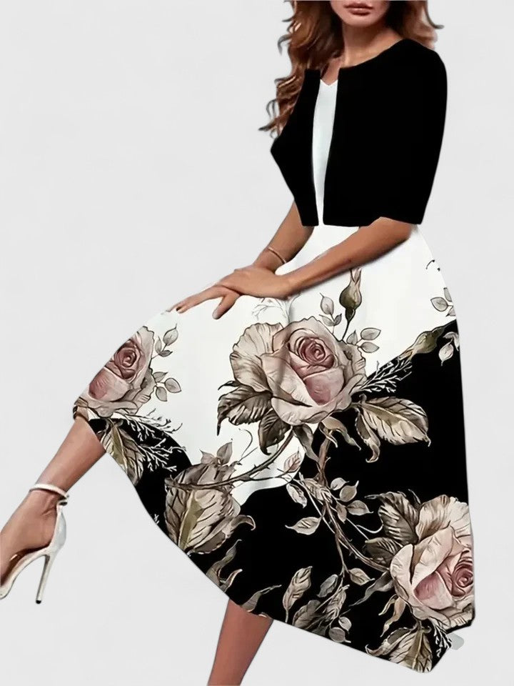 Women's chic floral print colorblock A-line midi dress with a stylish notch neck & three-quarter sleeves.