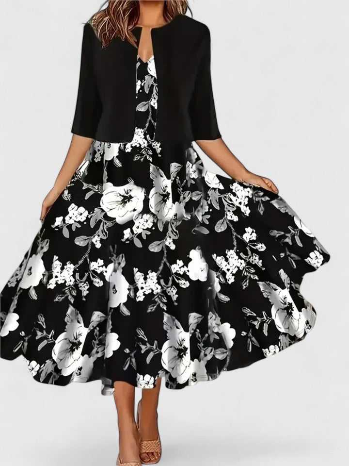 Elegant women's midi dress featuring vibrant floral print, colorblock design & stylish notch neck. Chic fashion.