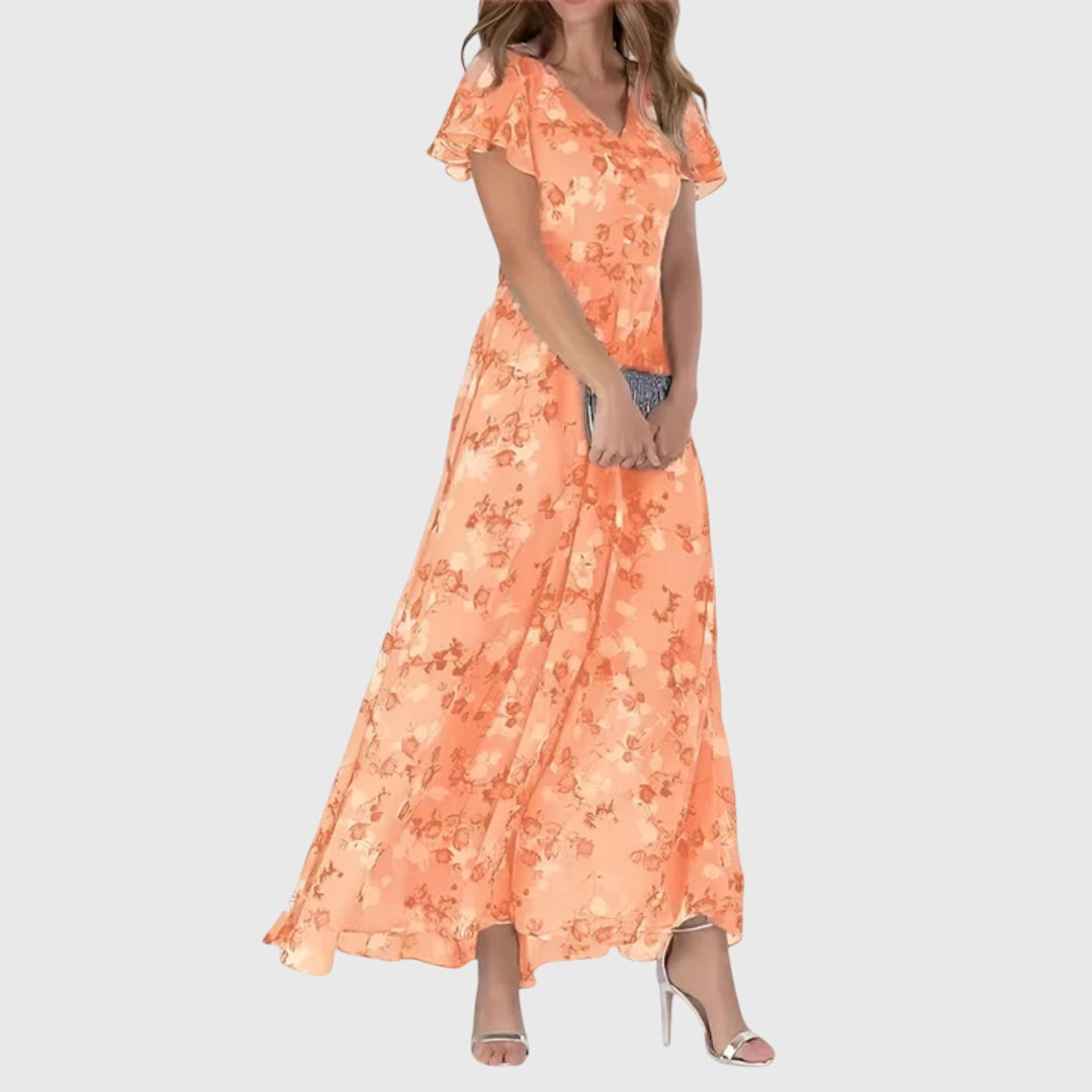Women's floral print maxi dress with elegant flutter sleeves & v-neck, perfect for summer parties.