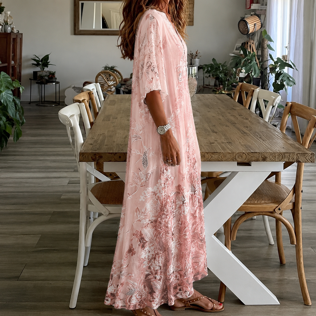 Elegant women's half-sleeve split-neck floral print maxi dress, a comfortable and stylish casual summer outfit.