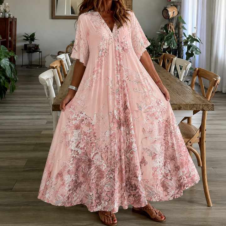Stylish women's summer floral print maxi dress, featuring a split neck and half sleeves, for a chic day look.