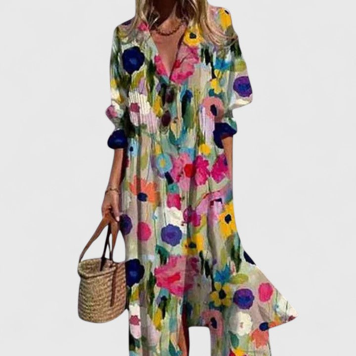 Women's floral print V-neck shirtdress with half sleeves, pintuck pleats, and a stylish collar.