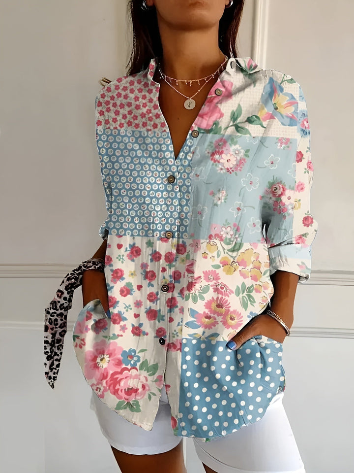 Relaxed fit women's floral print long sleeve blouse. Oversized button-down shirt for warm weather style.