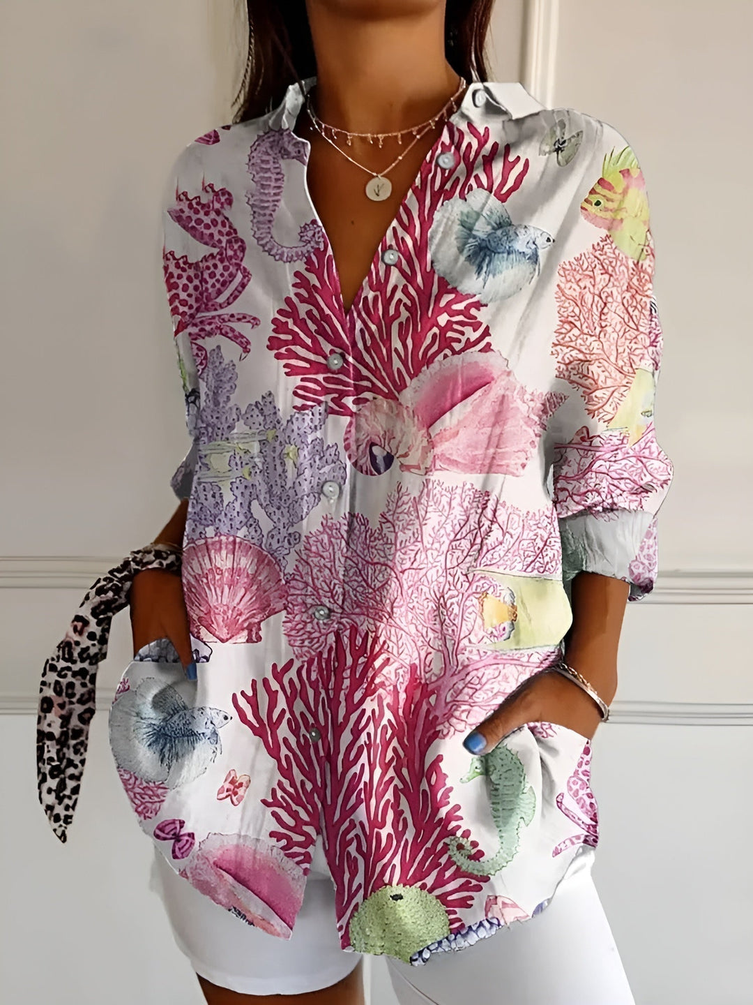 Comfortable women's floral print oversized button-down blouse. Ideal long sleeve top for summer and casual wear.