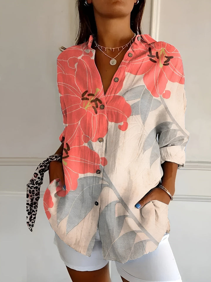 Easy-to-wear women's floral print oversized blouse. Button-down shirt for versatile summer and warm weather looks.