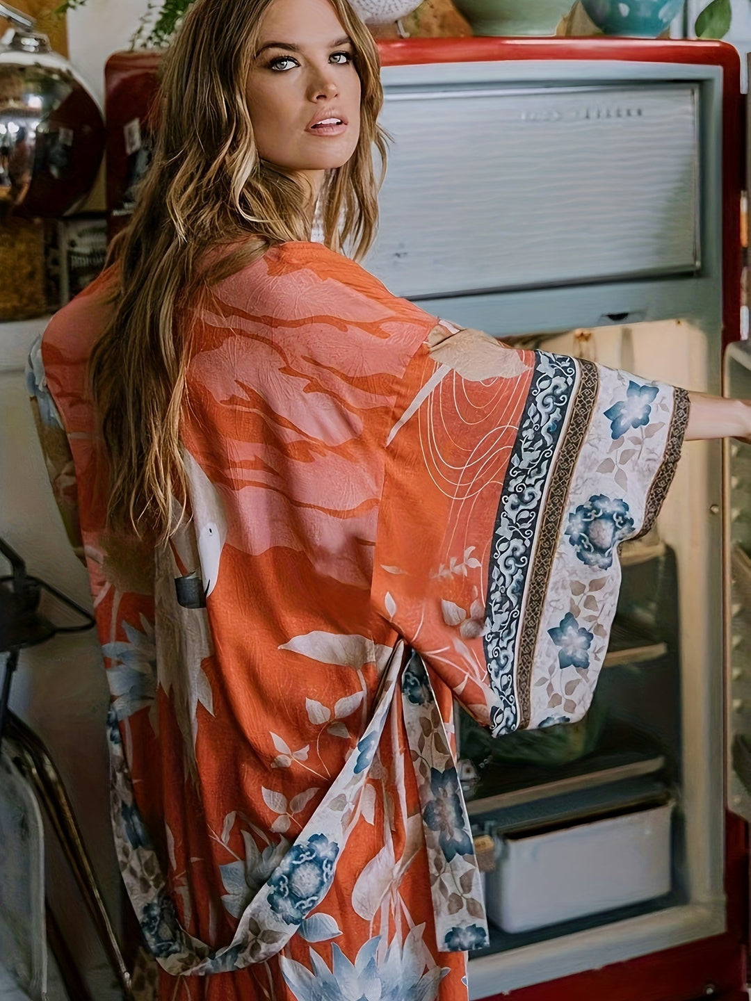Fashionable women's floral kimono, perfect resortwear and beach cover-up.