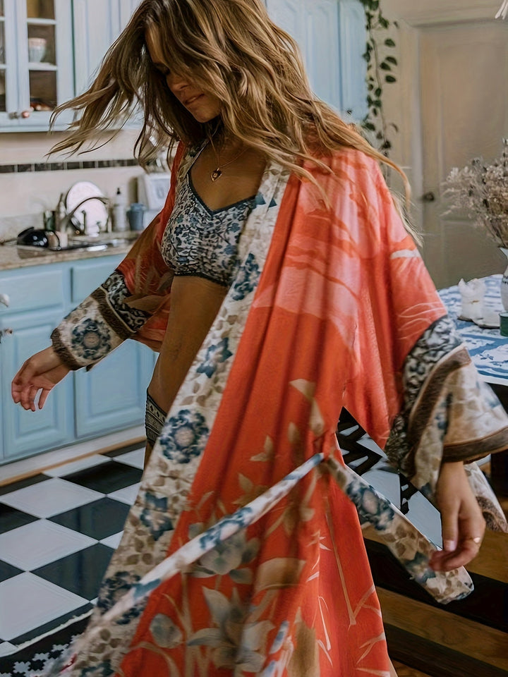 Soft, lightweight women's floral kimono, stylish resortwear for beach days.