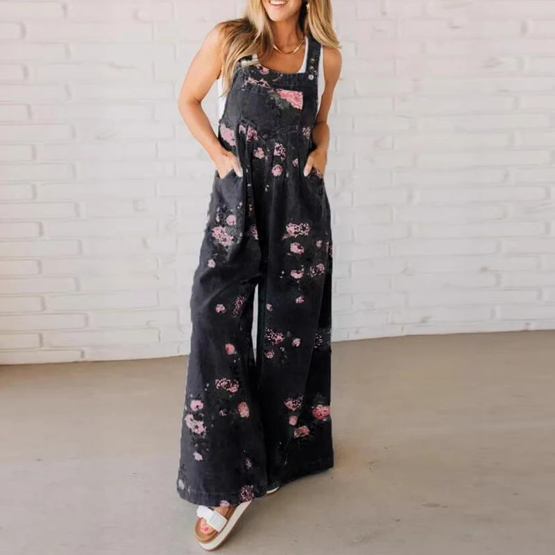 Boho chic women's wide leg floral print jumpsuit. Relaxed fit dungaree style, ideal for comfortable casual summer wear.