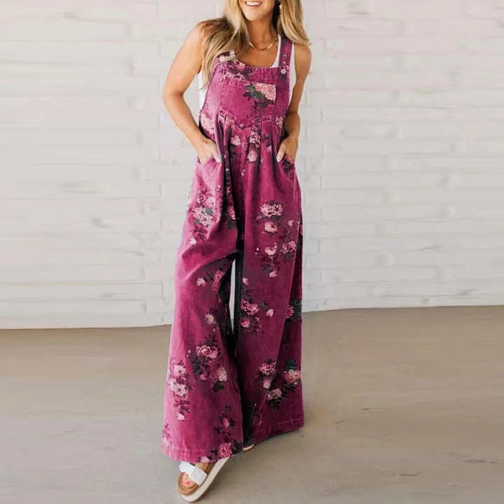 Floral print wide leg romper jumpsuit for women. Stylish and comfortable spring/summer overalls for casual outings.