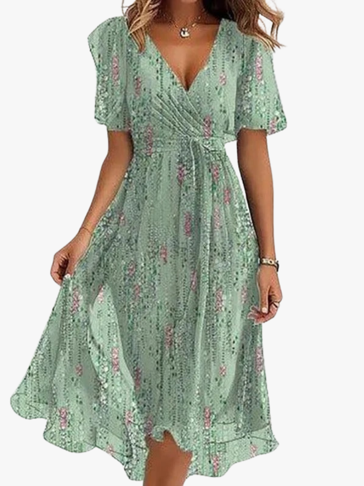 Women's floral print wrap V-neck midi dress with flutter sleeves & ruffle hem. Elegant summer casual wear.