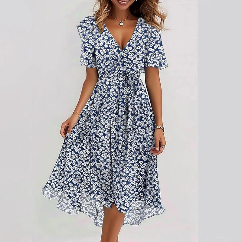 Elegant women's floral wrap midi dress, V-neck, flutter sleeves. Ideal for summer parties & casual events.