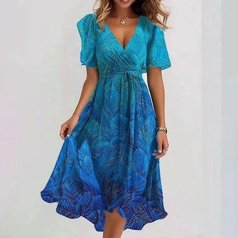 Flattering women's V-neck wrap midi dress with flowy flutter sleeves and a chic ruffle hem. Casual elegance.