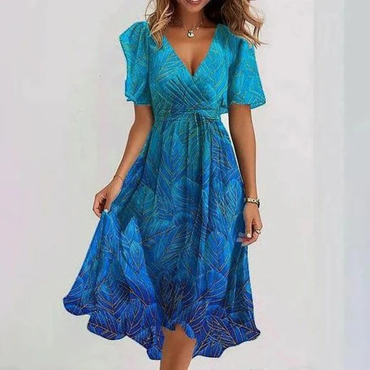 Flattering women's V-neck wrap midi dress with flowy flutter sleeves and a chic ruffle hem. Casual elegance.