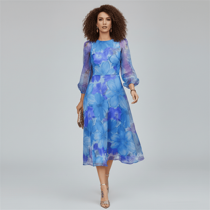 Chic women's floral A-line midi dress with puff sleeves. Elegant fit for wedding guests, parties & summer wear.