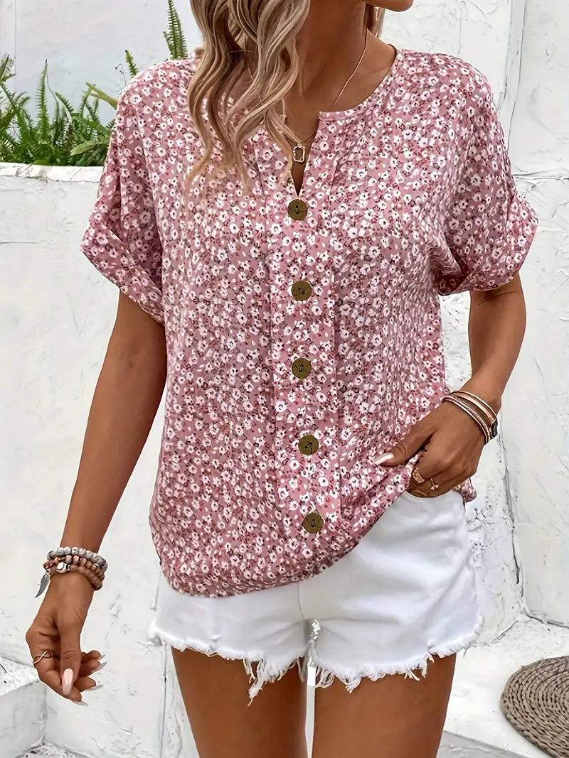 Stylish women's floral print button-up blouse in a relaxed fit, great for effortless spring & summer fashion.