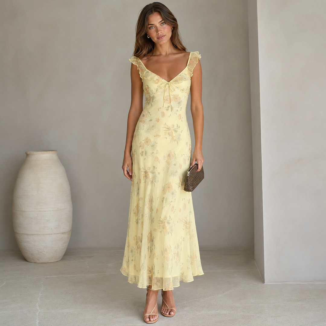 Women's floral sleeveless backless beach dress, perfect for summer vacations.