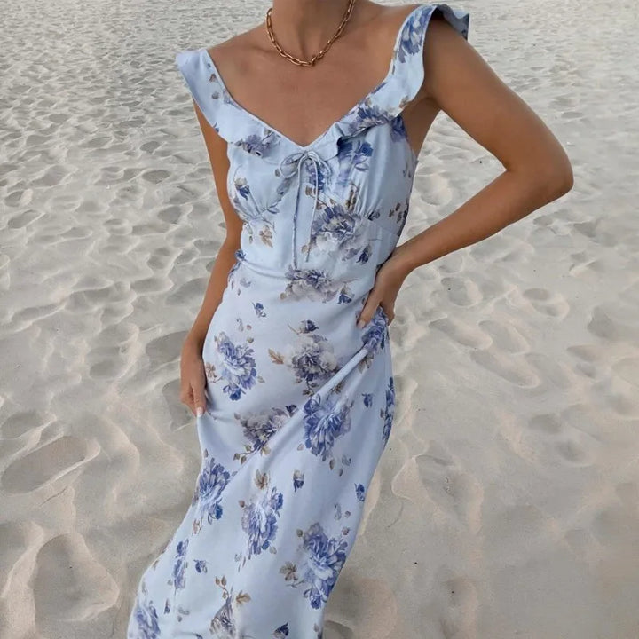 Women's floral sleeveless backless beach dress, a chic summer vacation & casual outfit.