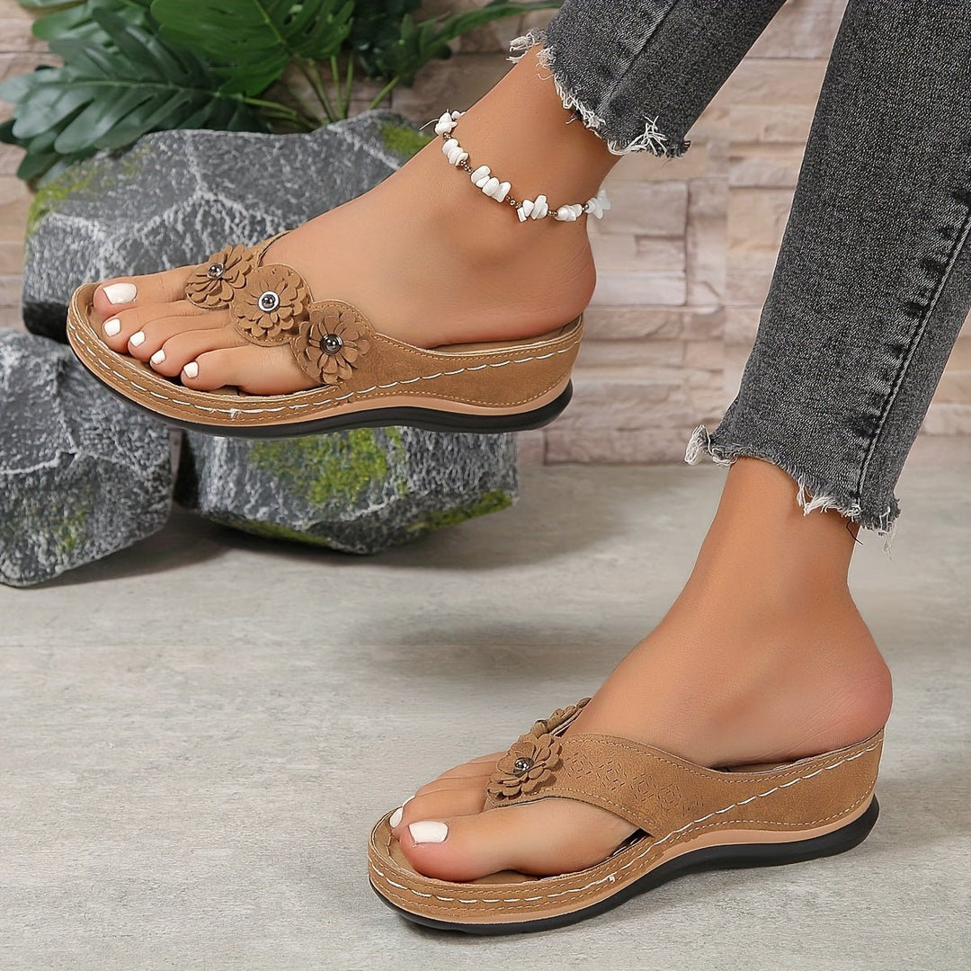 Stylish women's floral platform wedge sandals. Easy slip-on design for comfortable summer casual wear.