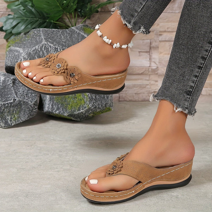 Stylish women's floral platform wedge sandals. Easy slip-on design for comfortable summer casual wear.