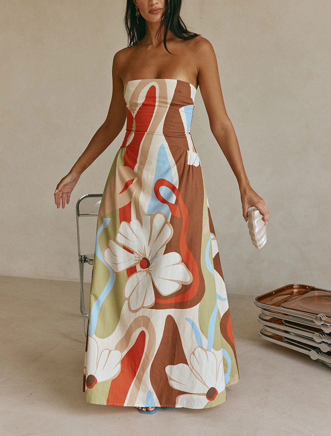 Women's floral strapless maxi dress, perfect for summer resort wear & elegant vacation outfits.