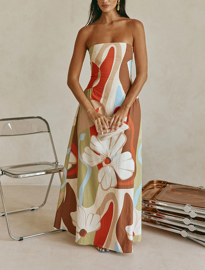 Flowy women's strapless floral maxi dress, an effortless summer style & comfortable resort wear.
