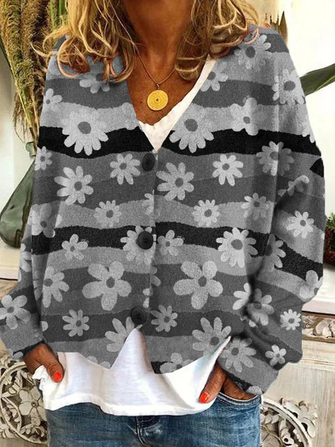 Stylish women's floral stripe button-up cardigan. A vibrant, relaxed fit sweater, great for spring/fall layering.