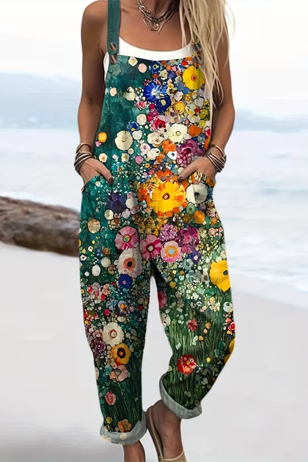 Casual women's floral print suspender jumpsuit with strappy back & button details for summer fashion.