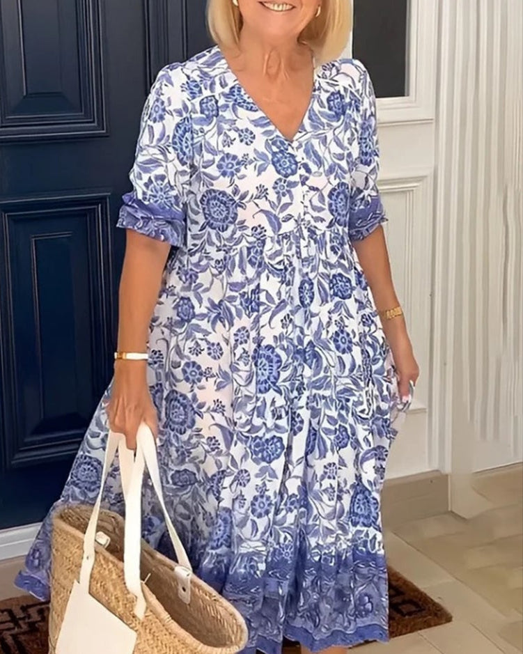 Feminine women's floral print V-neck A-line dress with comfortable fabric, ideal for stylish spring outings.