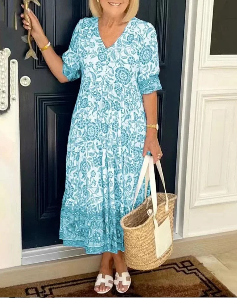 Versatile women's floral V-neck A-line dress, suitable for both casual and elegant spring & summer occasions.