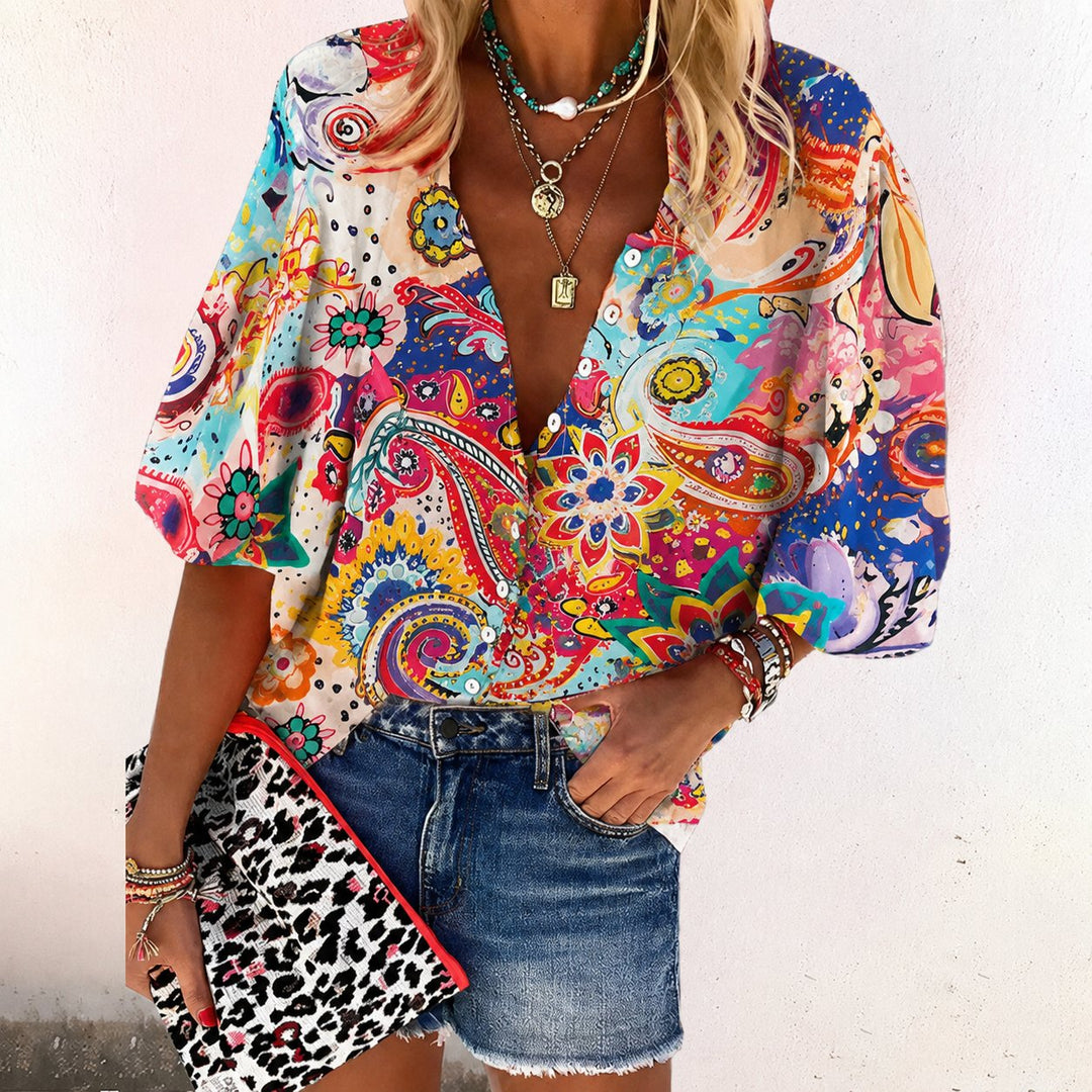 Feminine bohemian floral V-neck blouse, short sleeve, perfect for spring/summer casual wear.