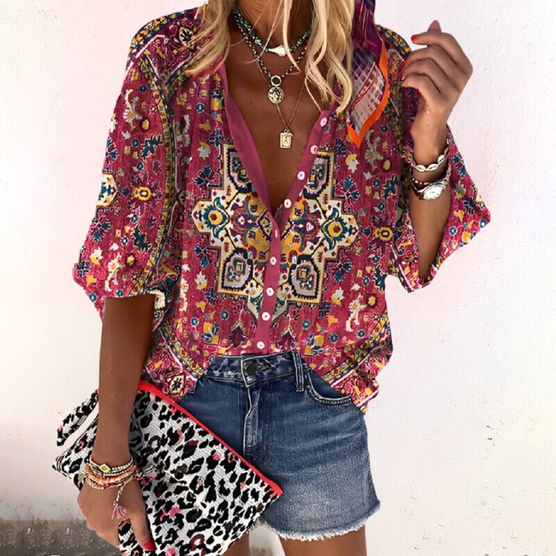 Relaxed fit women's floral V-neck blouse, button-front, short sleeve, ideal for vacation or brunch.