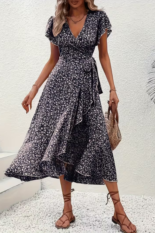 Feminine floral V-neck women's dress, elegant short-sleeve design perfect for summer chic style.