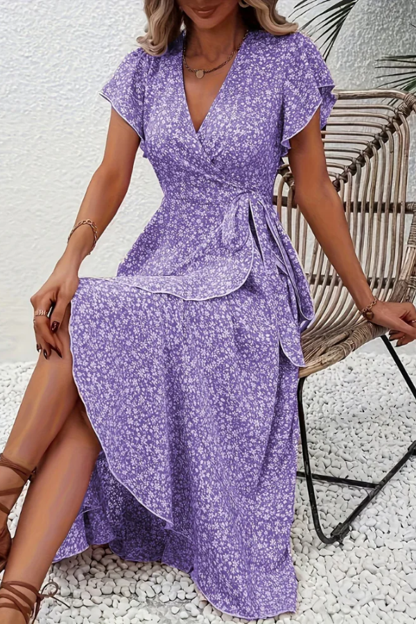 Fitted women's floral V-neck dress, elegant short-sleeve design for chic summer parties or daywear.