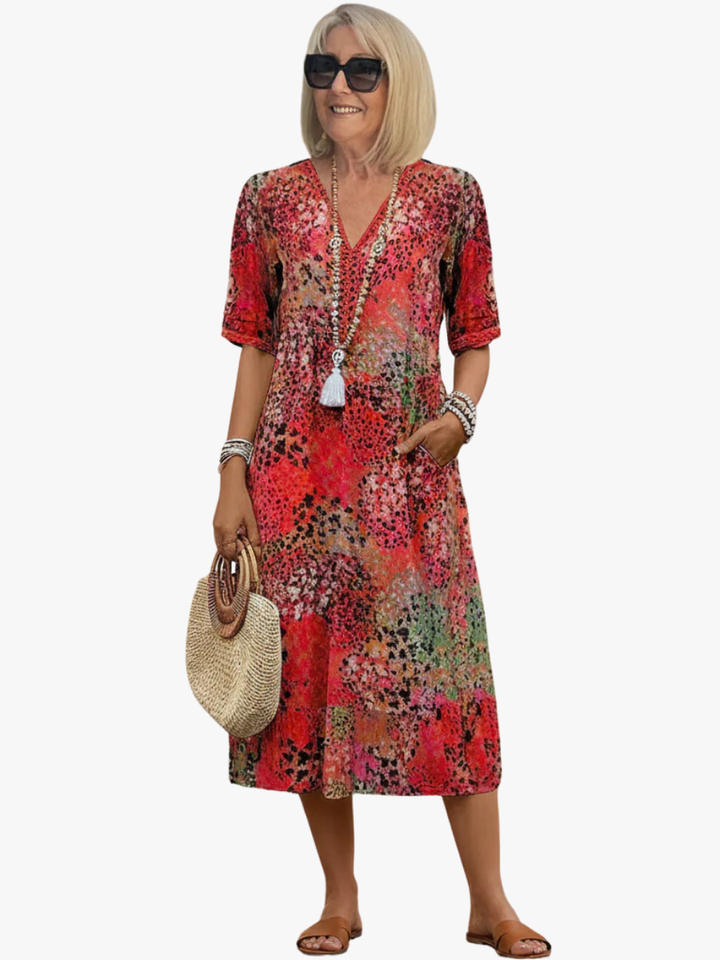 Women's floral V-neck midi dress, perfect for effortless everyday summer style.