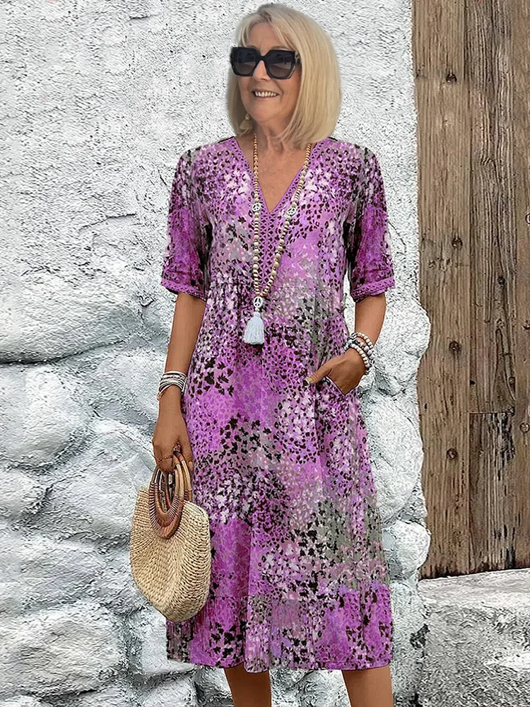 Elegant women's a-line floral midi dress, a chic V-neck design for spring and summer events.